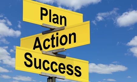 Plan, action, success signage