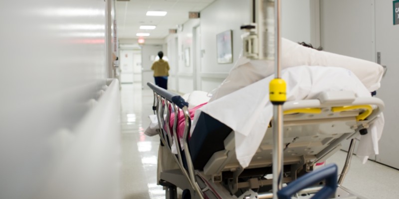 hospital bed in a corridor